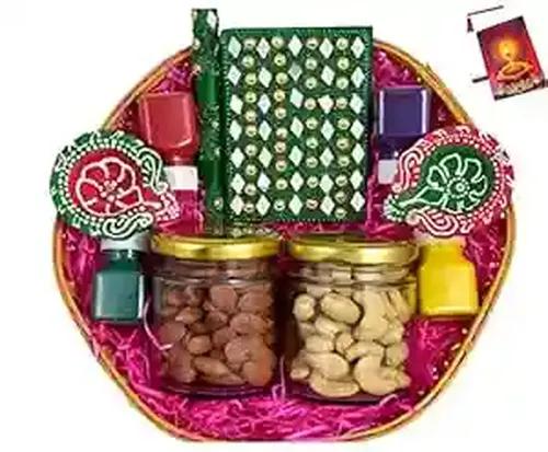 Diwali dry fruits/Diwali gift items/Diwali gift box/Diwali gift hampers-Decorated basket+200gms dry fruits in glass jar(Almonds,Cashews)+2 diya+showpiece figurine+rangoli colours+Diwali greeting card