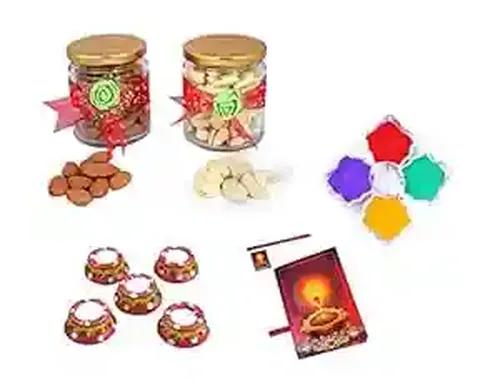 MANTOUSS Diwali Dry Fruit Decorative Glass Jar-Almond and Cashew(100gms Each),200 GMS + 2 Matki Wax Filled Diya, Diwali Greeting Card and Rangoli Colours