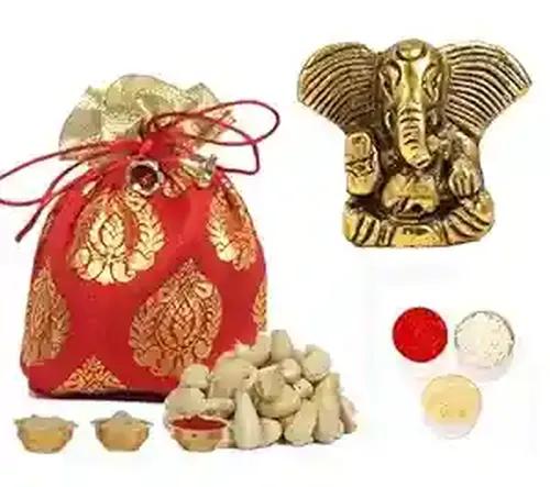 Bhaiya dooj gift set for brother/bhai dooj gift for brother/bhai dooj gift/bhai dooj gift set/bhaiya dooj roli chawal for brother-potli of cashew+metal ganesha idol+roli chawal chandan