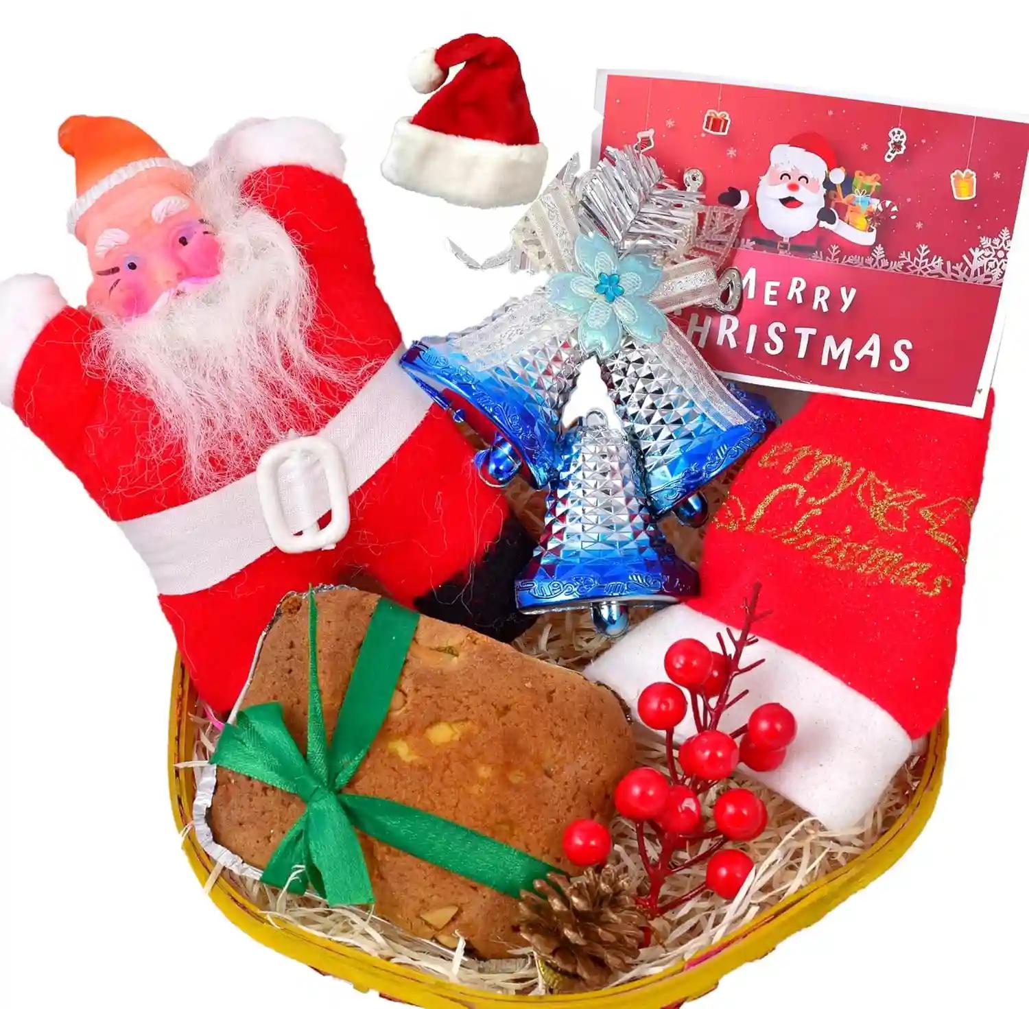 Christmas Gift Basket/Christmas Gifts/Christmas Cake-Decorated Basket+200gms veg plum Cake+Santa Claus Soft Toy+Christmas Decorative Bells+Bunch of Decorative Cherry+Pine Cone+Santa Claus Cap+Card